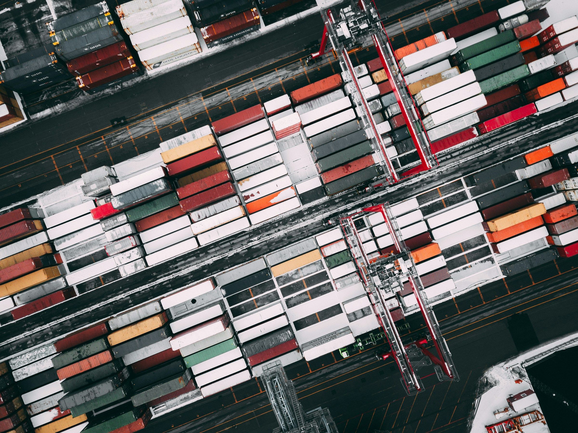 Aerial view of a container terminal with cranes